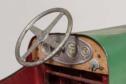 A pedal car in painted metal and repainted...