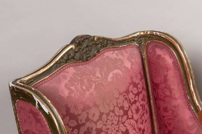 Suite of four carved, stuccoed, gilded and...