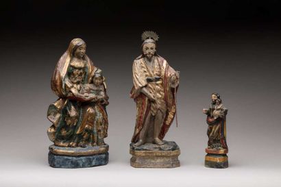 Three religious statuettes in polychrome...