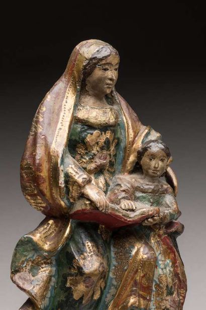 Three religious statuettes in polychrome...
