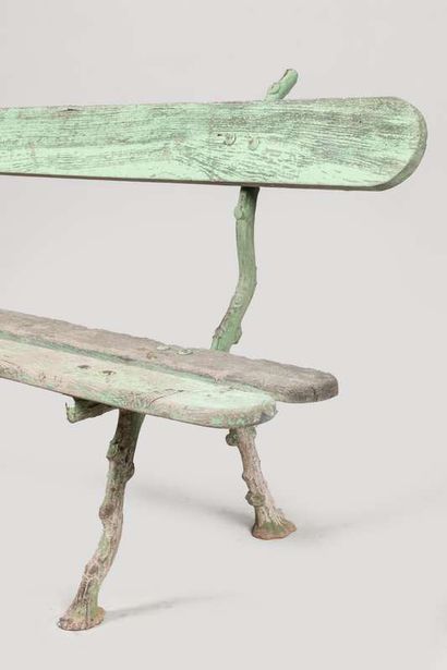 Pair of garden benches, the legs in cast...