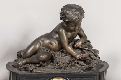 Mantelpiece including a marble and bronze...