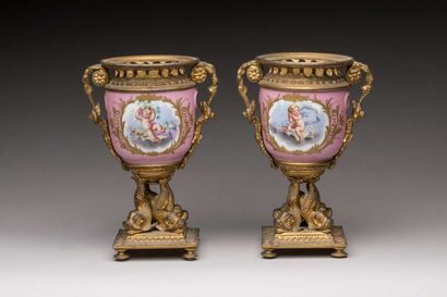 Pair of porcelain vases and bronze mounts...
