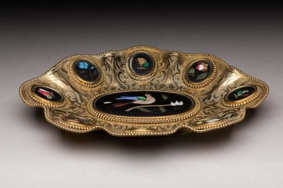 Gilded metal bowl of oval shape, with wavy...