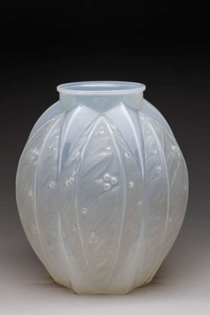 Vase out of opalescent moulded glass assembled...