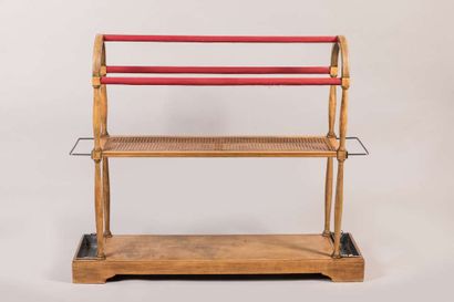 Dresser in natural wood forming an arch and...