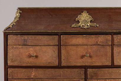 Cardboard end of desk in rosewood and rosewood...