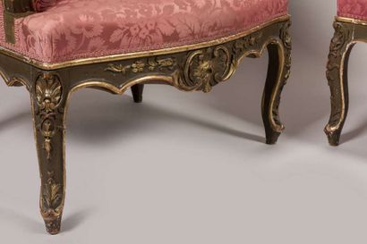 Suite of four carved, stuccoed, gilded and...
