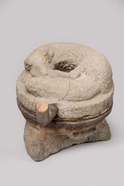 Salt mill in stone decorated with a fox
Old...
