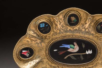 Gilded metal bowl of oval shape, with wavy...