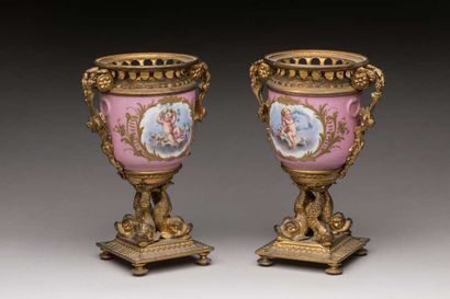 Pair of porcelain vases and bronze mounts...