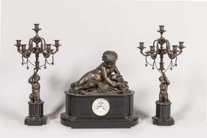 Mantelpiece including a marble and bronze...