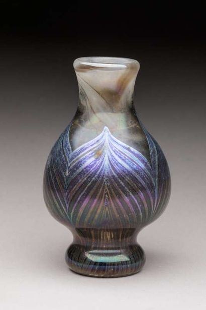 ART REED New Studio
 Small glass vase decorated...