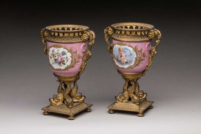 Pair of porcelain vases and bronze mounts...