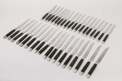 Sixteen knives with ebony handles, twenty...