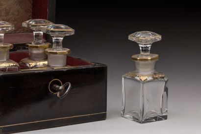 Small square-shaped ebony or blackened wood...