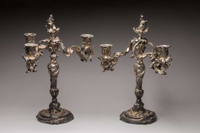 Pair of silver plated candlesticks with rocaille...