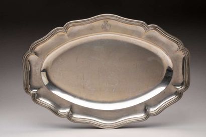 Oval silver platter with scalloped edges...
