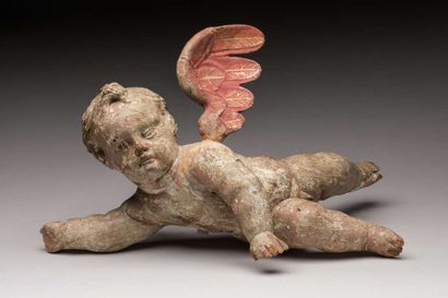 Angelot in carved and painted wood incomplete
17th...