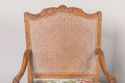 Pair of armchairs with a cane base, molded...
