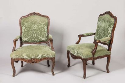 Pair of armchairs in carved wood decorated...