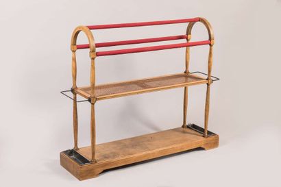 Dresser in natural wood forming an arch and...