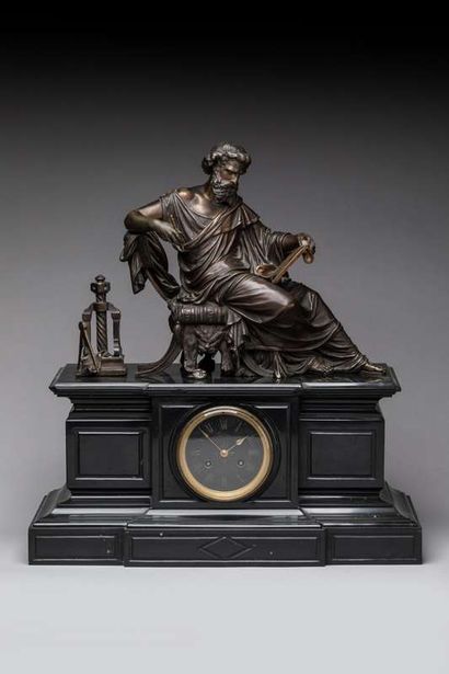 Black marble mantel clock, decorated in the...