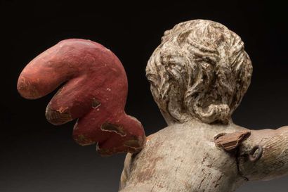 Angelot in carved and painted wood incomplete
17th...