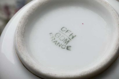 Eleven creamers and their tray in porcelain...