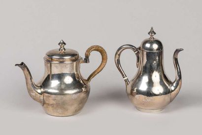 2 small self-serving pourers in plain silver,...