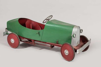 A pedal car in painted metal and repainted...