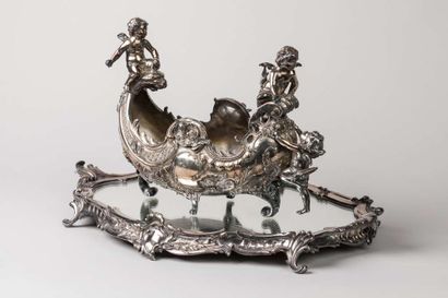 Planter in the shape of silver plated metal...