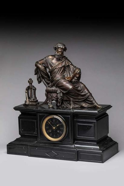 Black marble mantel clock, decorated in the...