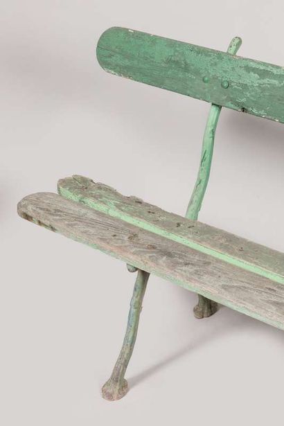 Pair of garden benches, the legs in cast...