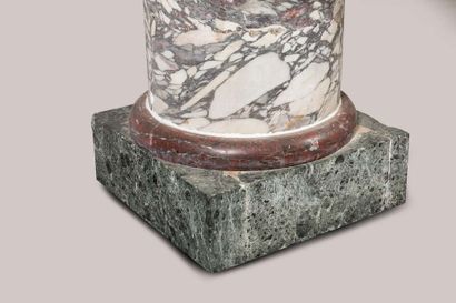 Pair of cylindrical columns in veined white...