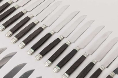 Sixteen knives with ebony handles, twenty...