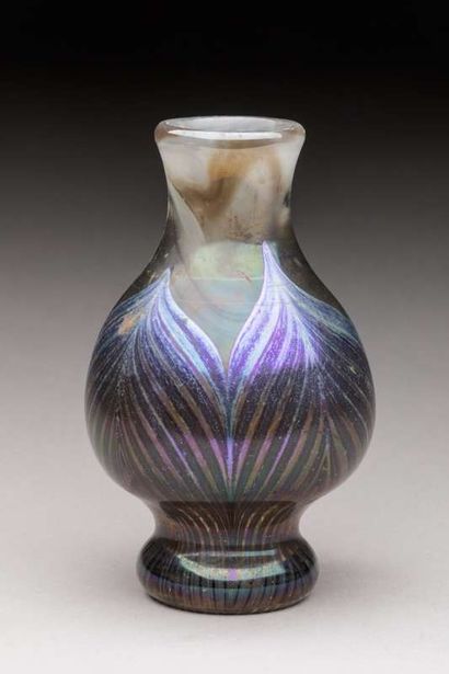 ART REED New Studio
 Small glass vase decorated...