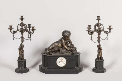 Mantelpiece including a marble and bronze...