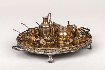 On a small silver and vermeil tray, miniature...