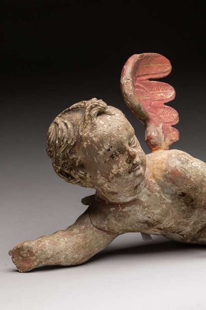 Angelot in carved and painted wood incomplete
17th...