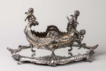 Planter in the shape of silver plated metal...