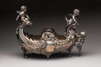 Planter in the shape of silver plated metal...
