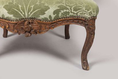 Pair of armchairs in carved wood decorated...