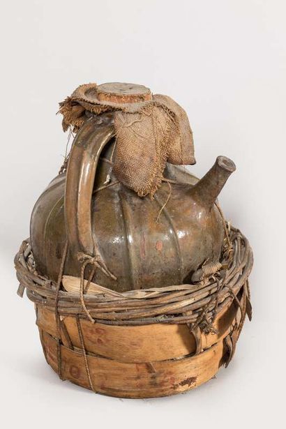 Three glazed earthenware oil jugs, two-handled...