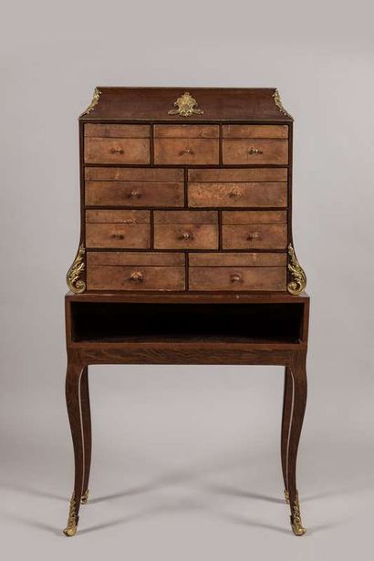Cardboard end of desk in rosewood and rosewood...