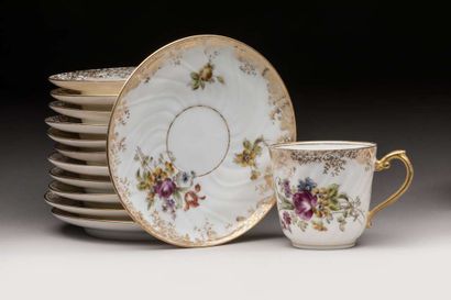 Eleven porcelain cups and saucers with floral...