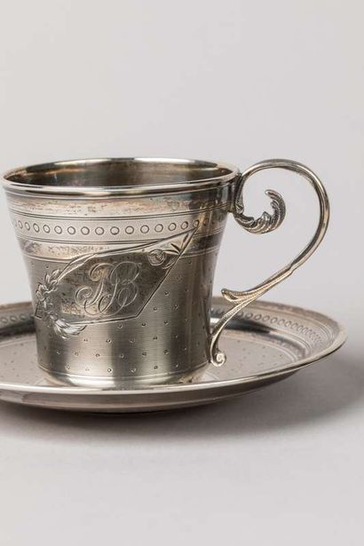 Two silver cups with saucers (one dented),...