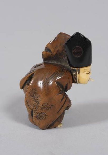 JAPON - XIXe siècle
Netsuke en buis et os,...