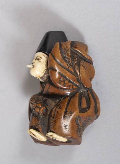 JAPON - XIXe siècle
Netsuke en buis et os,...