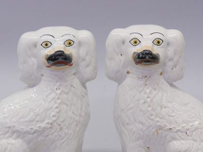 Pair of ceramic Staffordshire dogs. England,...
